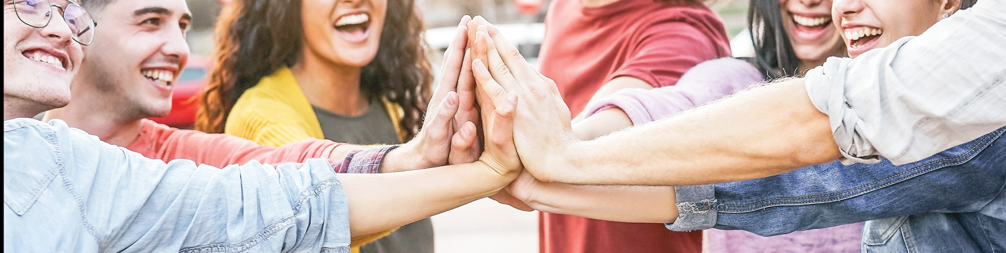 Diverse youth in a huddle